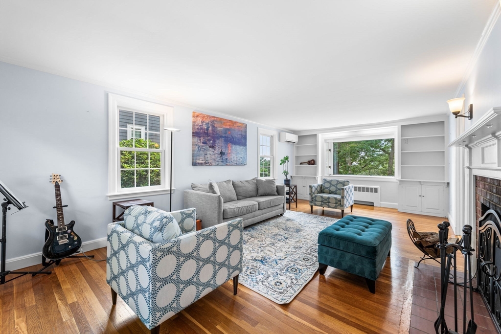 166 Hillcrest Road Needham, MA 02492 - Photo 6 of 36 a living room with furniture and a window