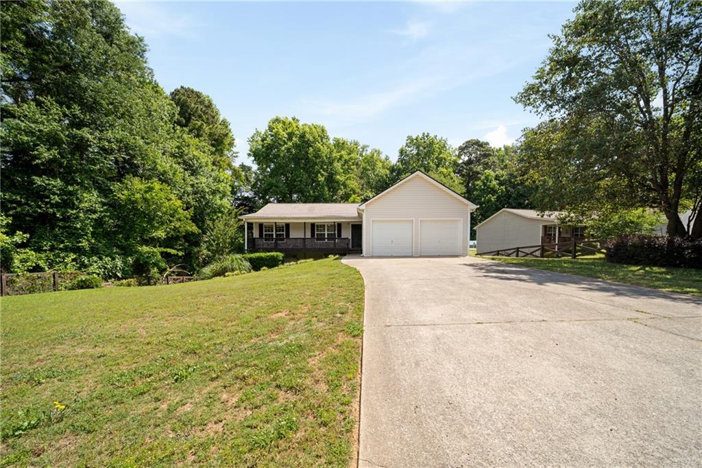 921 Pace Road Hiram, GA 30141 - Photo 2 of 41 a house view with a outdoor space