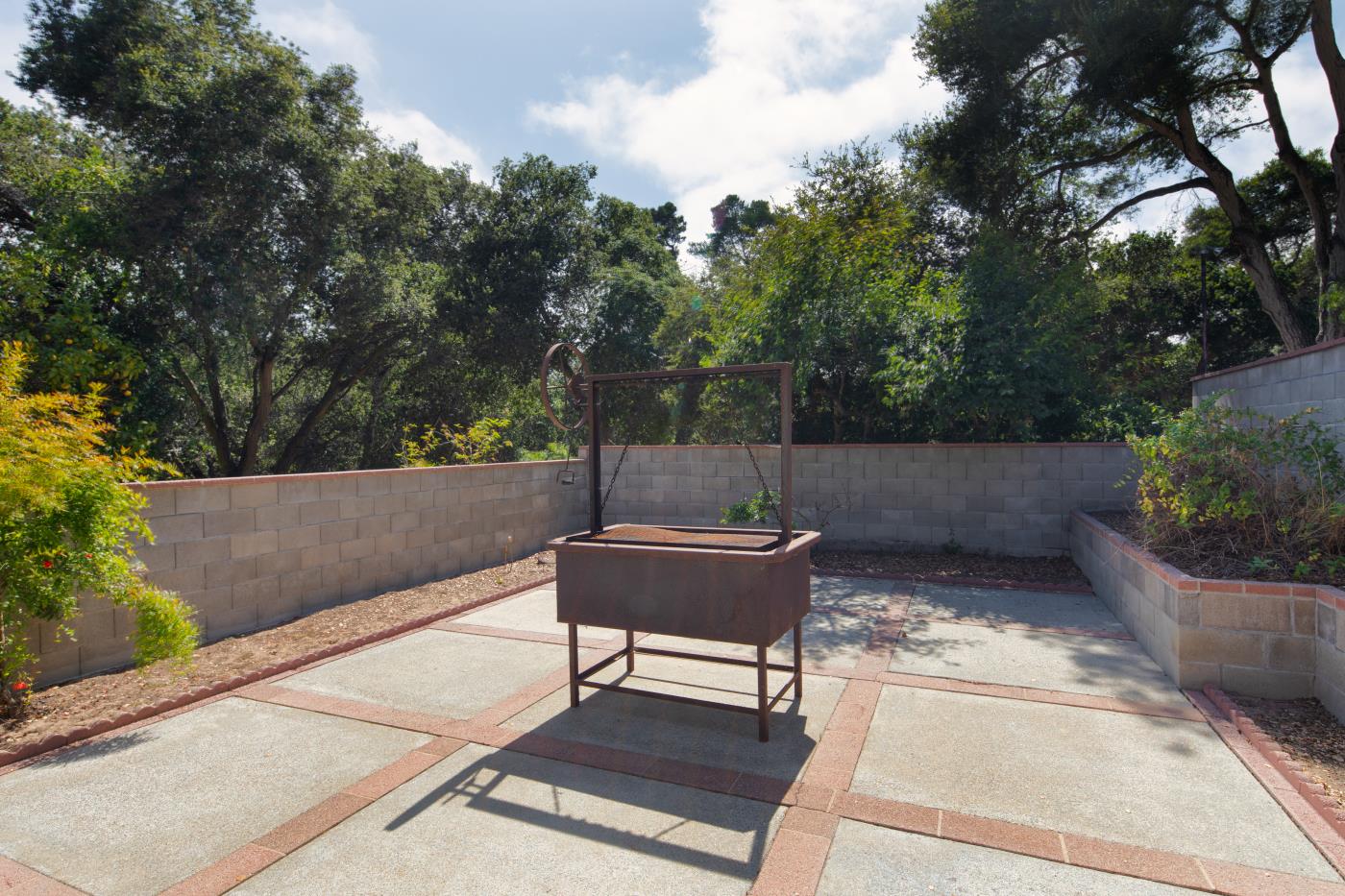 7600 Pine Tree Way Salinas, CA 93907 - Photo 20 of 43 a view of a bench in a backyard