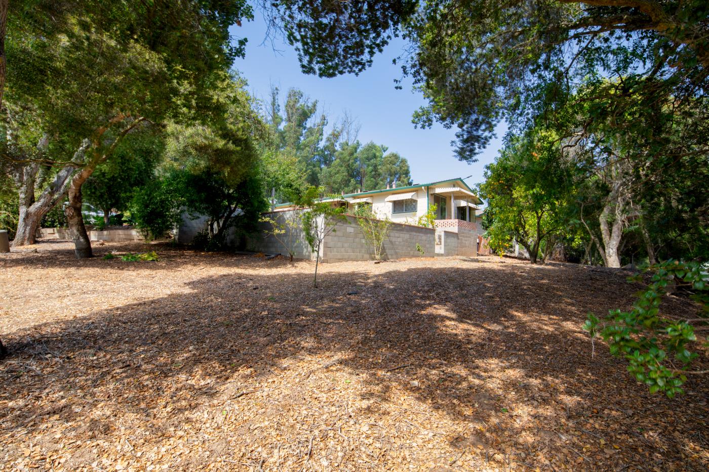 7600 Pine Tree Way Salinas, CA 93907 - Photo 29 of 43 a view of outdoor space with deck and trees