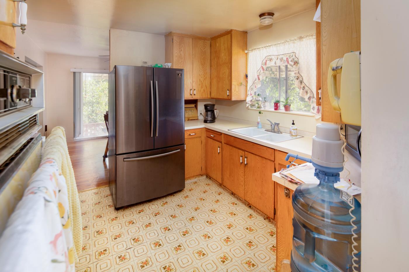 7600 Pine Tree Way Salinas, CA 93907 - Photo 31 of 43 a kitchen with stainless steel appliances a refrigerator sink and microwave