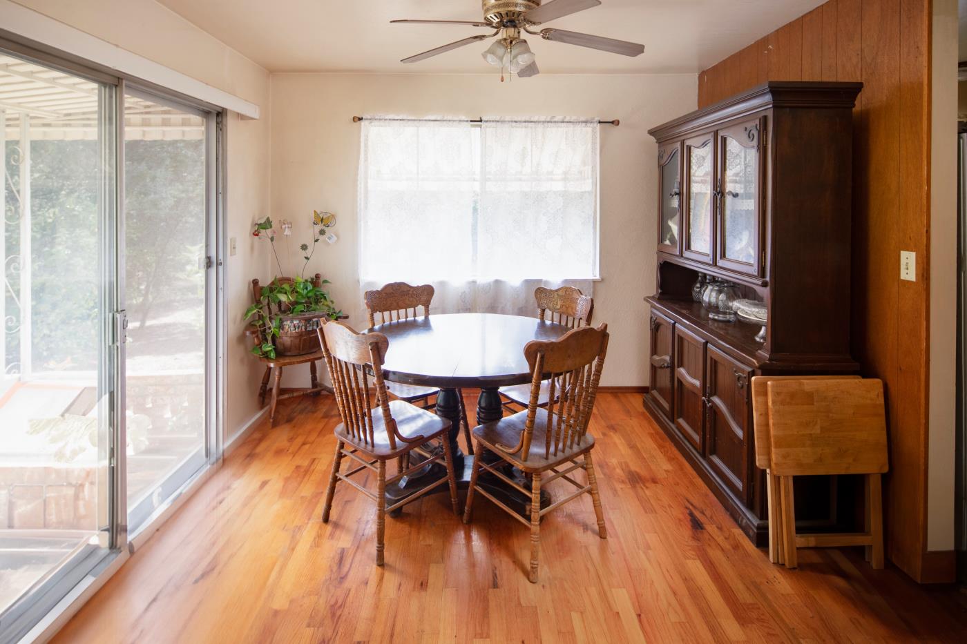 7600 Pine Tree Way Salinas, CA 93907 - Photo 33 of 43 a view of a dining room with furniture window and wooden floor