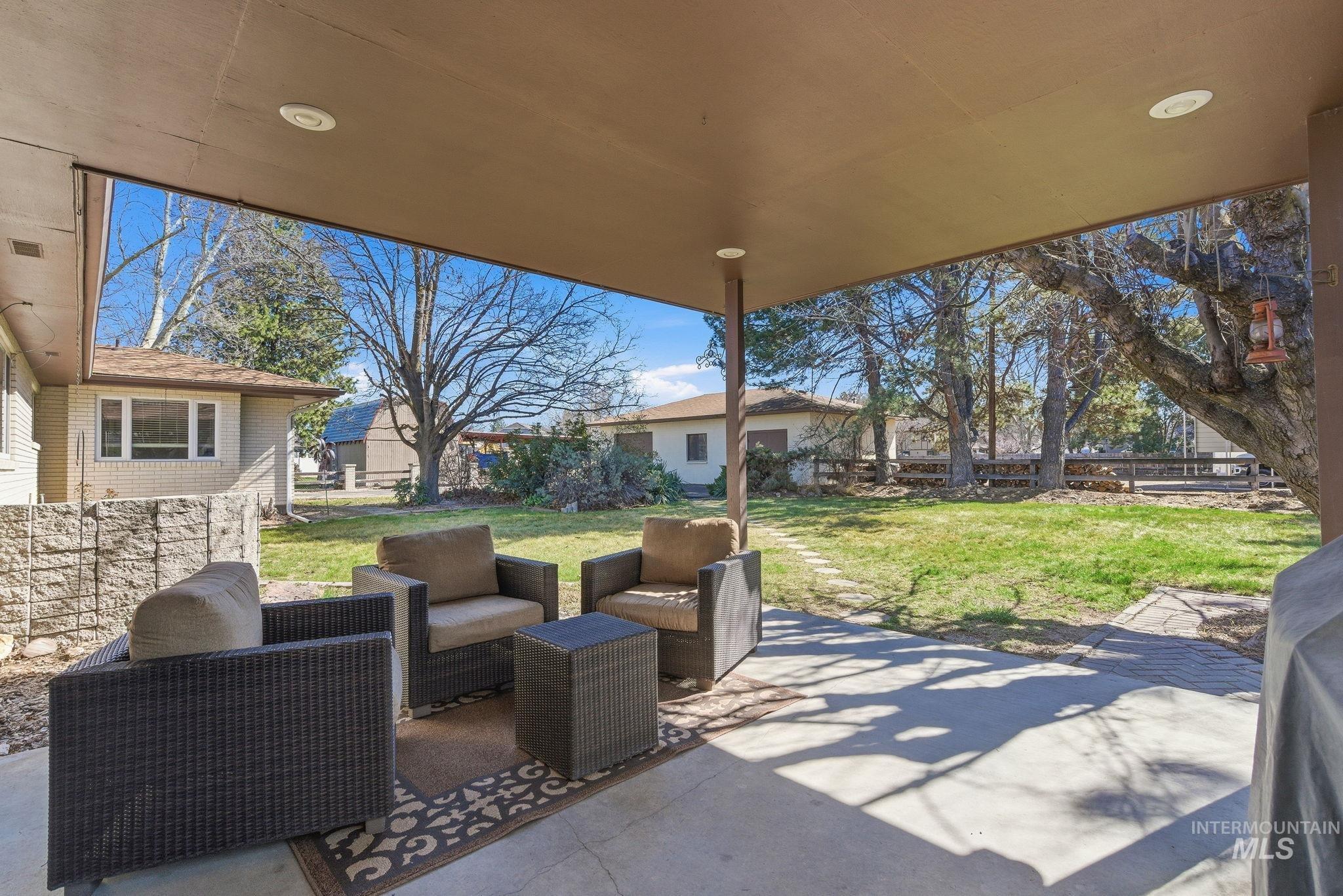 12055 West McMillan Road Boise, ID 83713 - Photo 24 of 42 View of patio featuring an outdoor lounge area