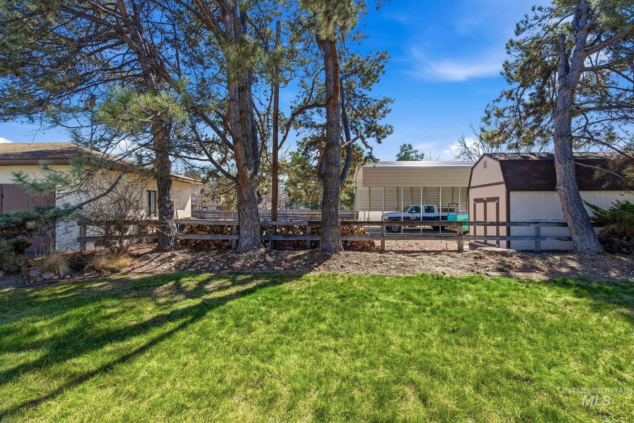 12055 West McMillan Road Boise, ID 83713 - Photo 27 of 42 View of yard featuring an outdoor structure