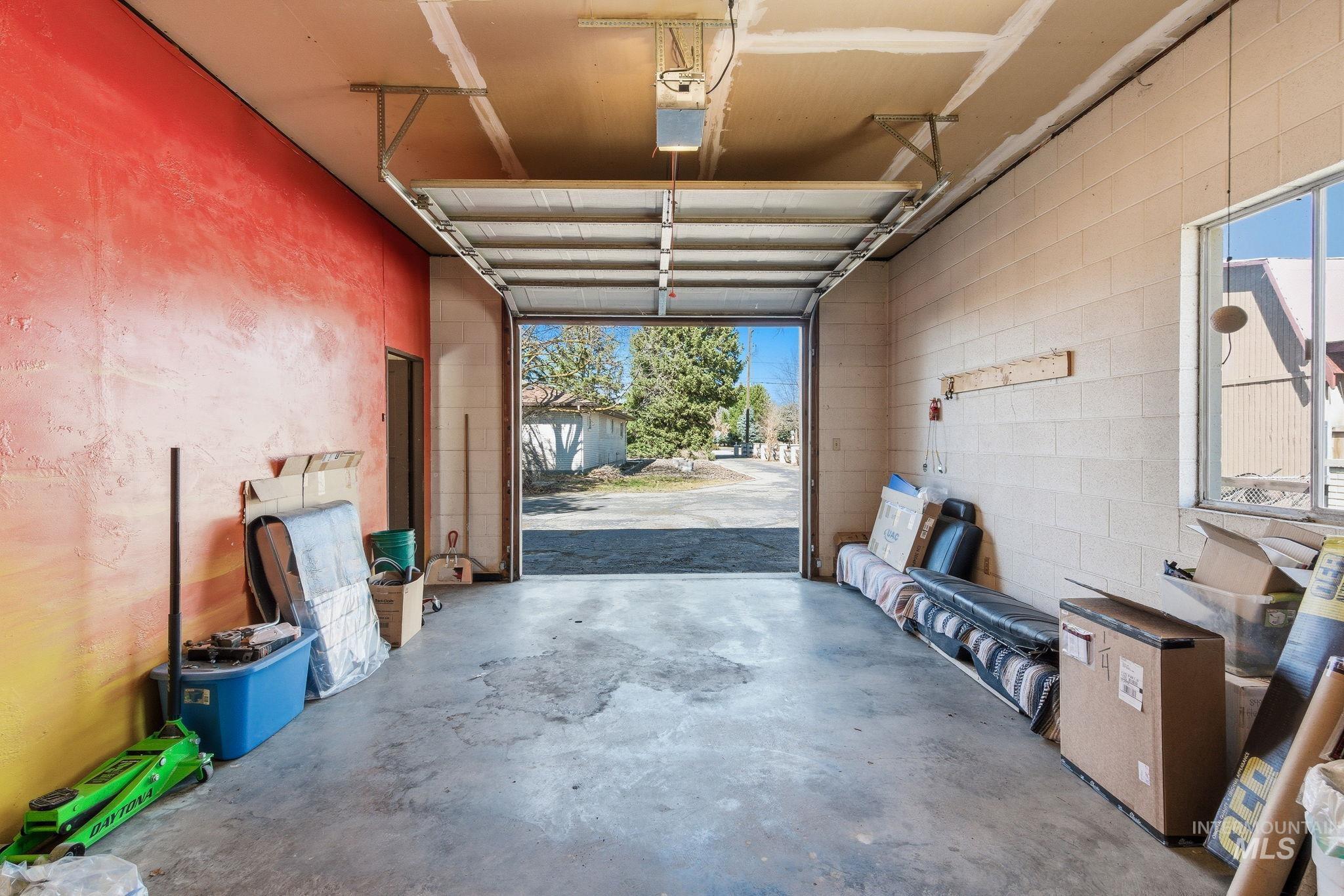 12055 West McMillan Road Boise, ID 83713 - Photo 40 of 42 Garage featuring concrete block wall