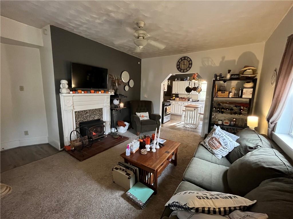 197 Oak Road Holbrook, PA 15341 - Photo 10 of 17 a living room with furniture and a fireplace