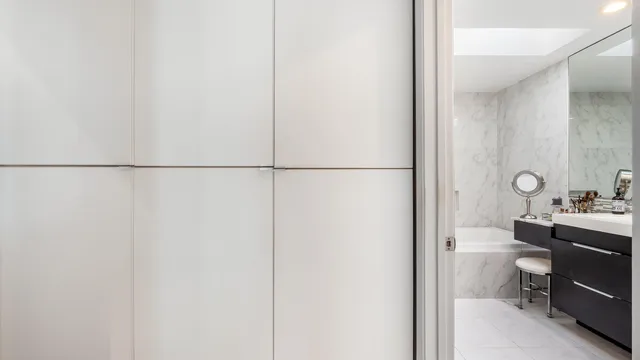 a bathroom with a sink toilet and vanity