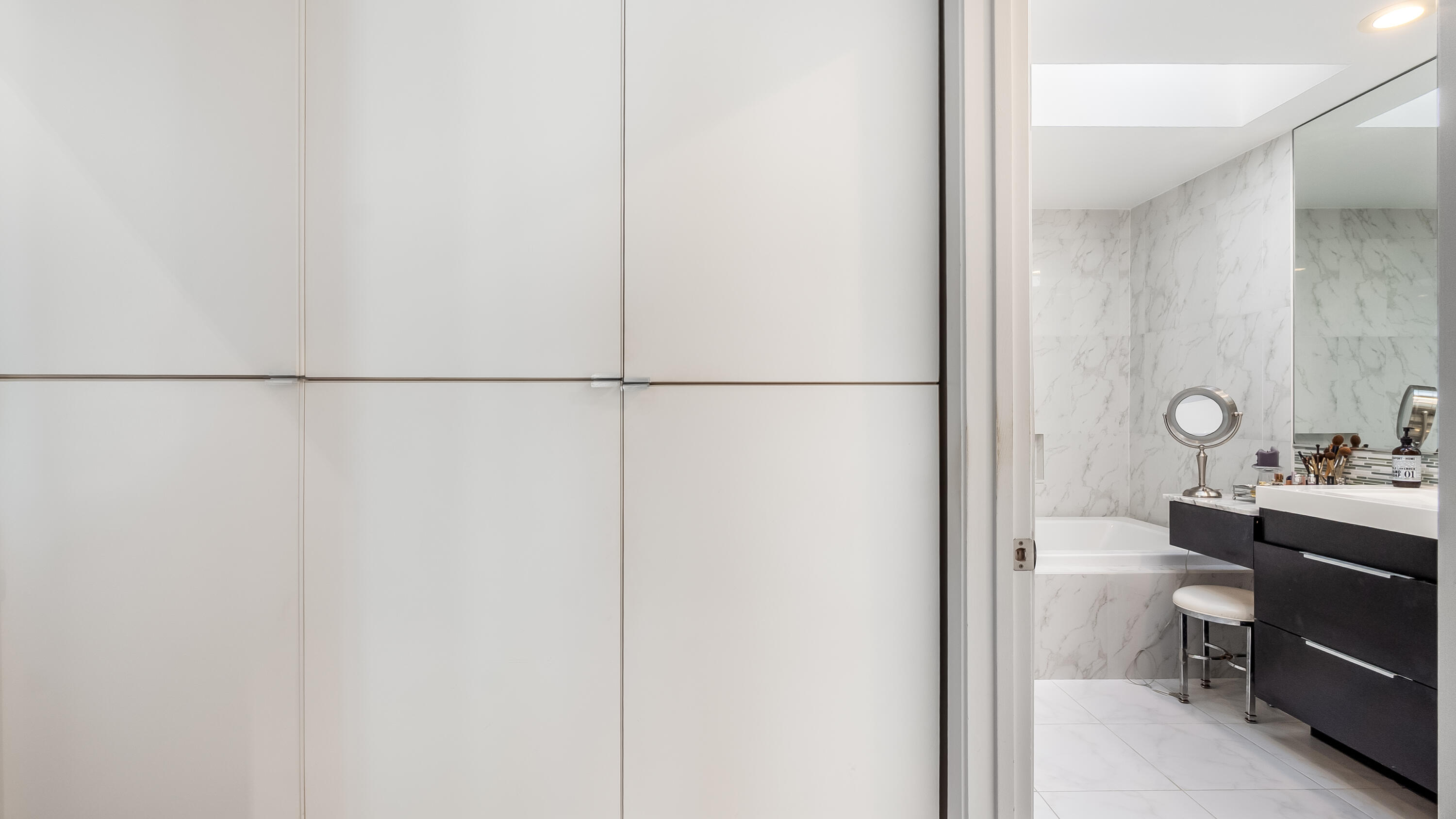 10208 Sunset Bend Drive Boca Raton, FL 33428 - Photo 17 of 40 a bathroom with a sink toilet and vanity