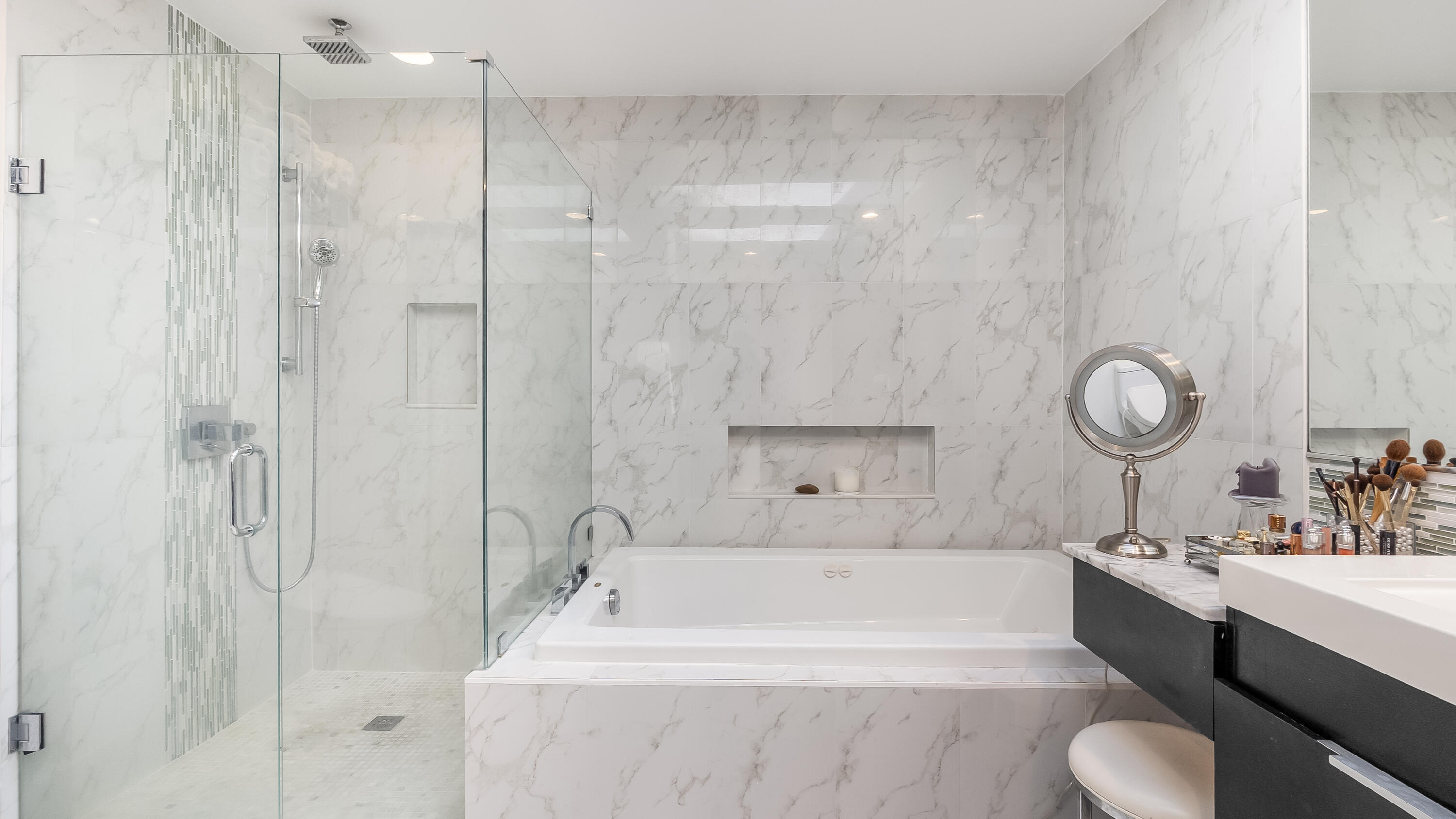 10208 Sunset Bend Drive Boca Raton, FL 33428 - Photo 19 of 40 a bathroom with a granite countertop sink a toilet and bathtub