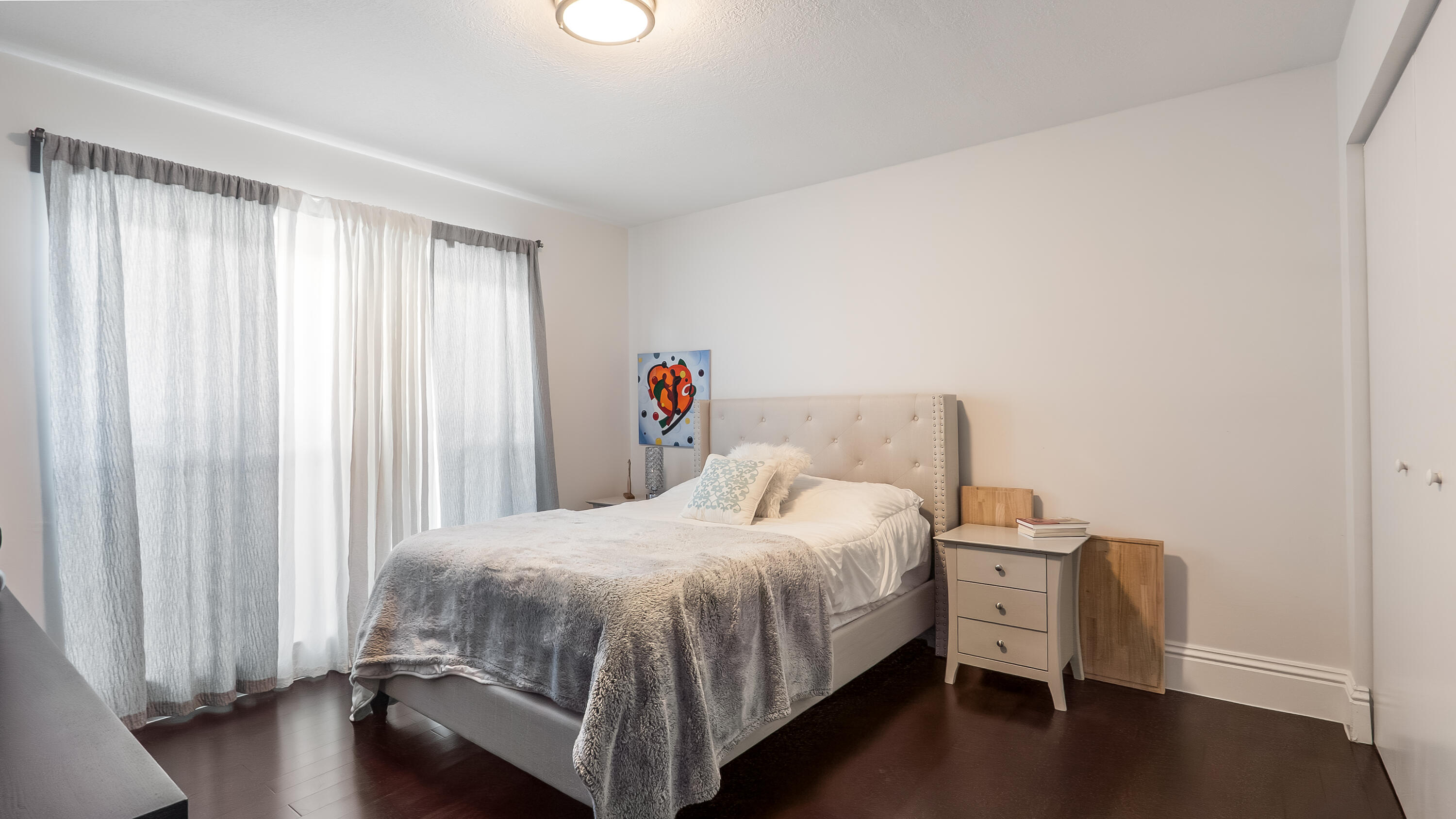 10208 Sunset Bend Drive Boca Raton, FL 33428 - Photo 21 of 40 a bedroom with a bed and a window