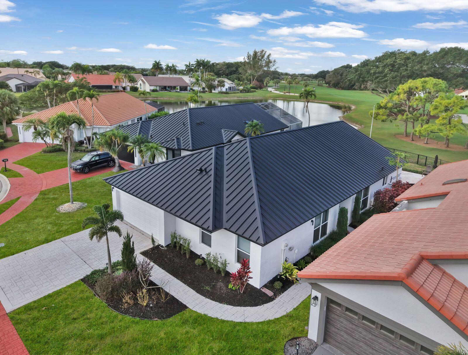 10208 Sunset Bend Drive Boca Raton, FL 33428 - Photo 27 of 40 an aerial view of a house with a garden and plants