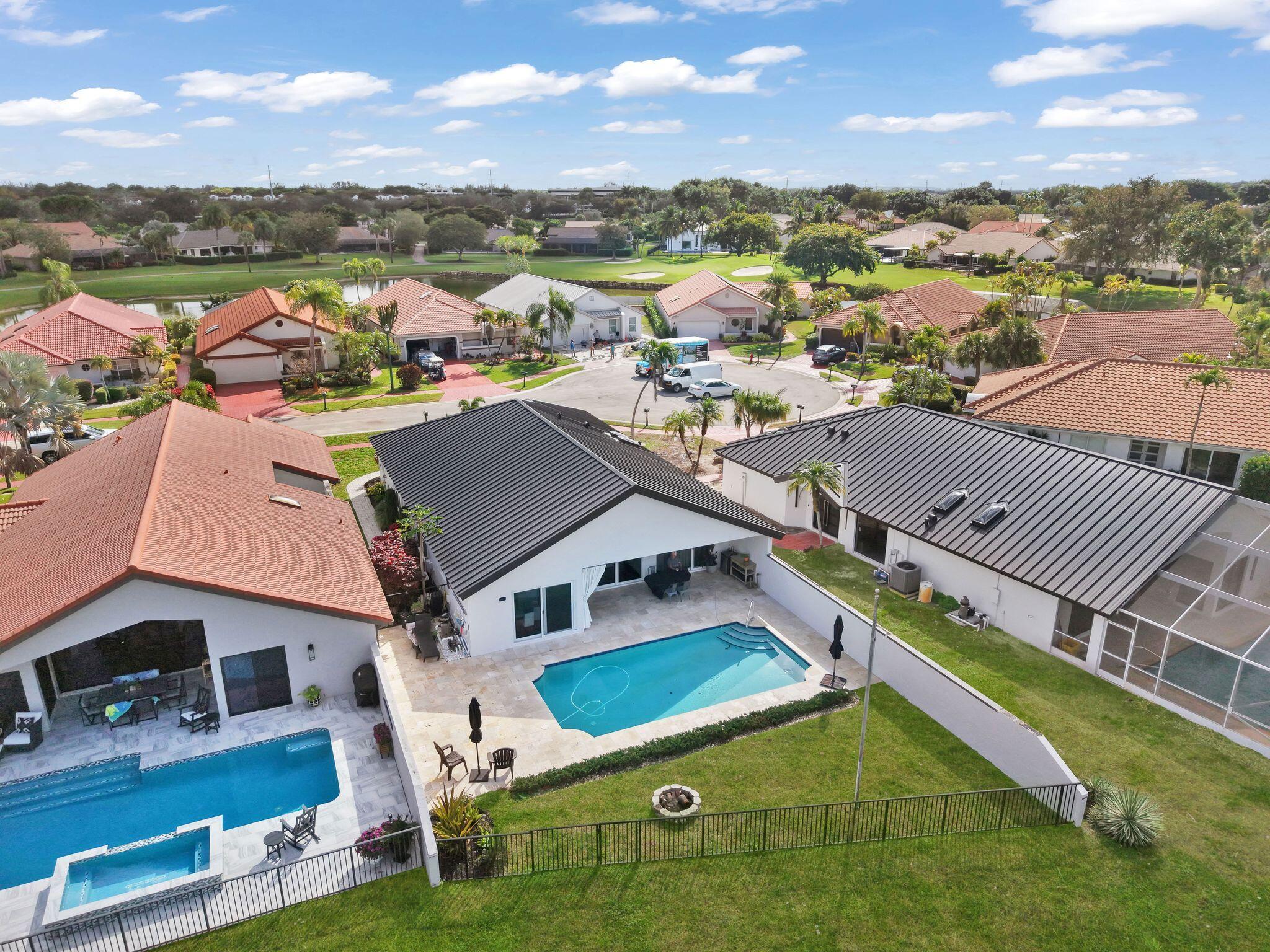 10208 Sunset Bend Drive Boca Raton, FL 33428 - Photo 28 of 40 an aerial view of houses with yard