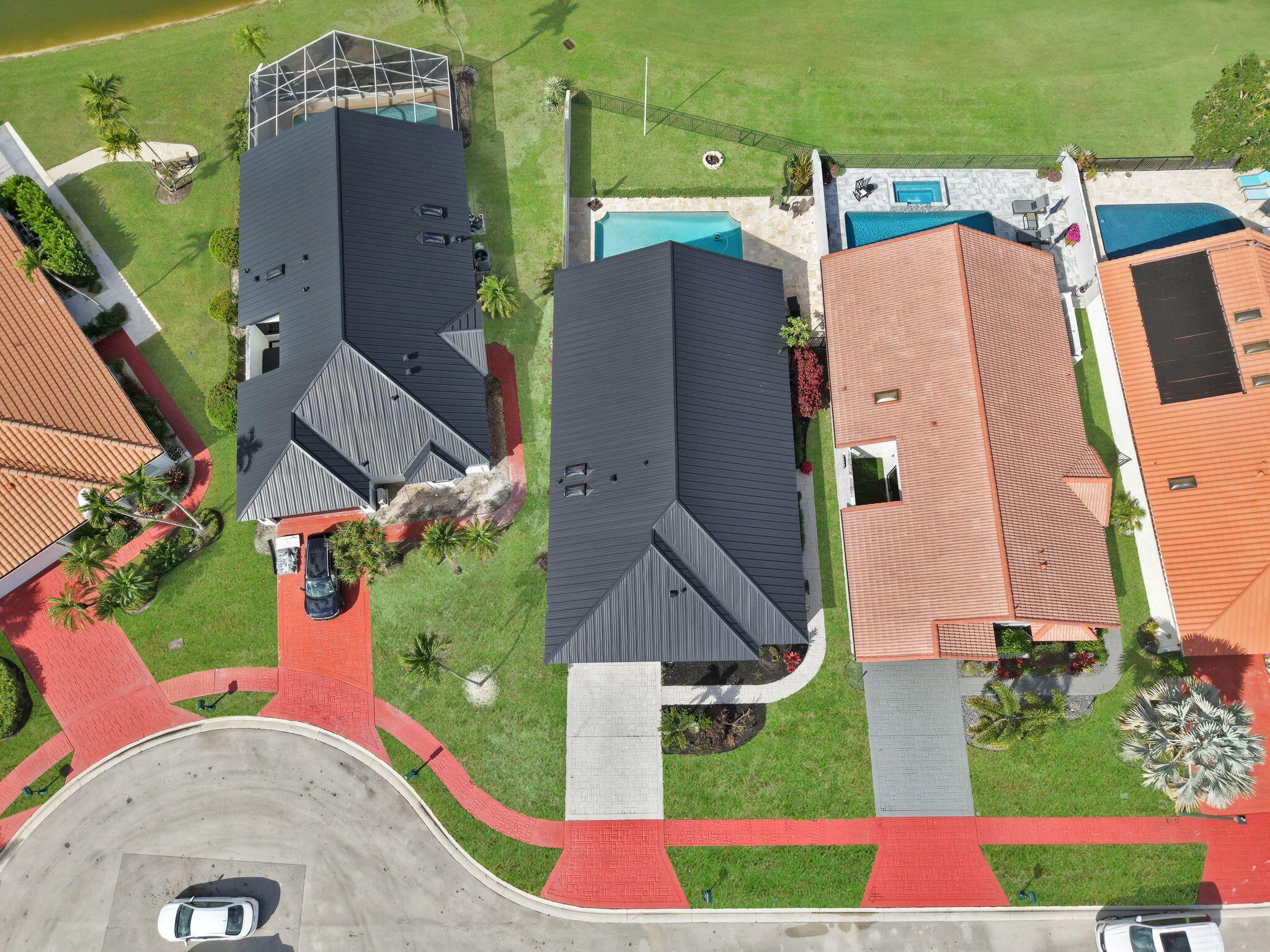 10208 Sunset Bend Drive Boca Raton, FL 33428 - Photo 31 of 40 an aerial view of a house with yard and garage