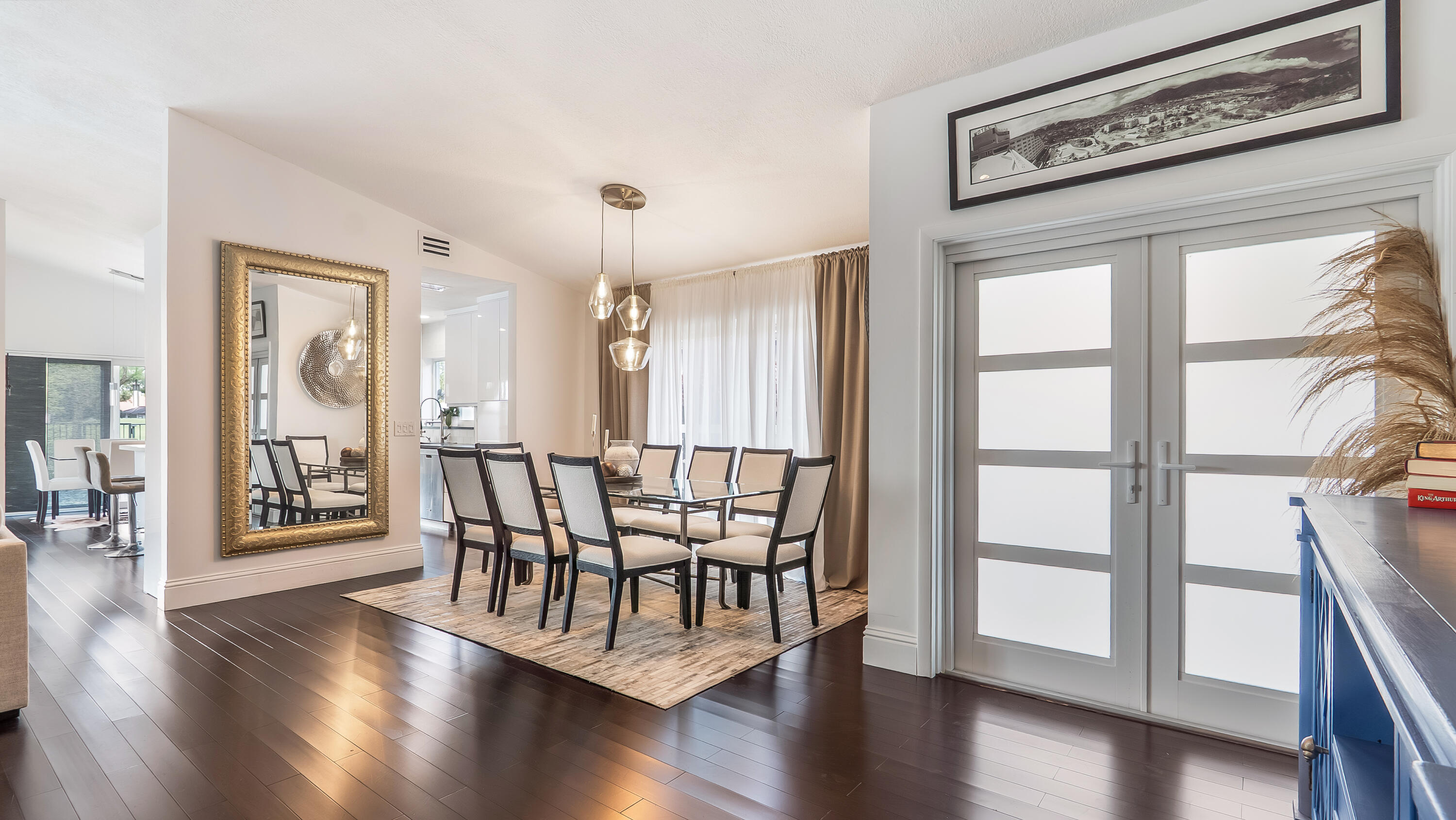 10208 Sunset Bend Drive Boca Raton, FL 33428 - Photo 7 of 40 a view of an empty room with wooden floor and a window