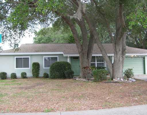 Exterior Front - Beautiful oak trees makes for nice shade and lower electric bills
