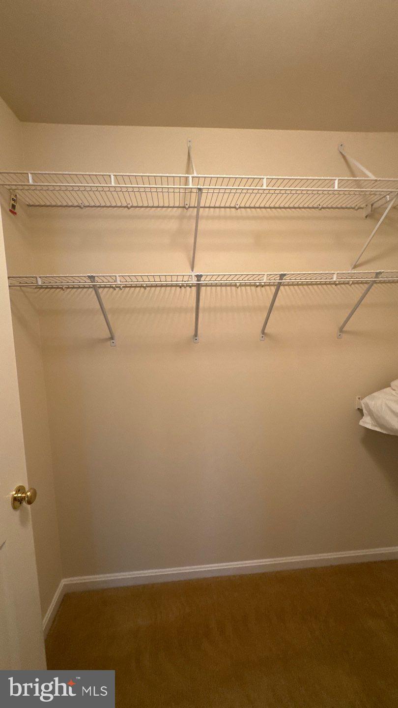 9150 Gracious End Court, Unit 103 Columbia, MD 21046 - Photo 12 of 18 a view of a water heater