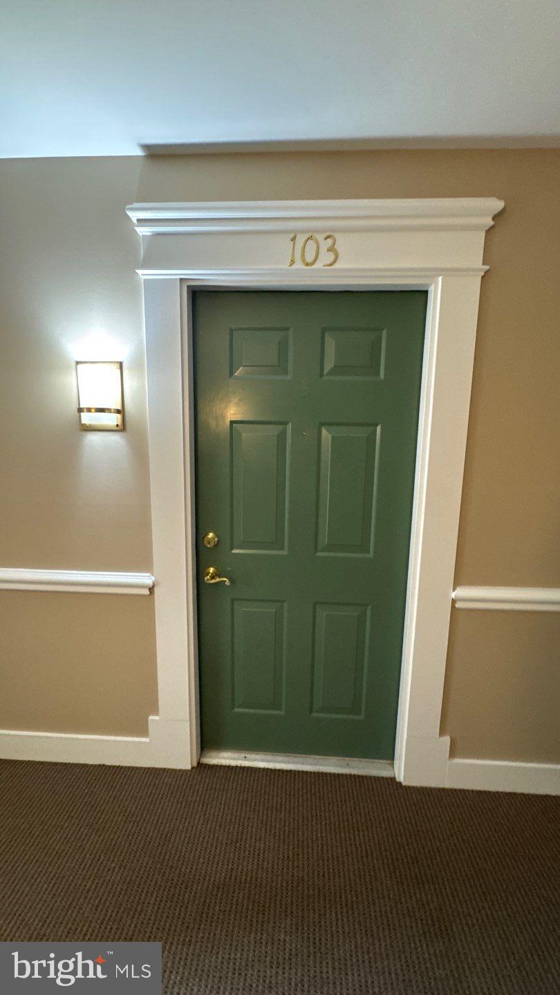 9150 Gracious End Court, Unit 103 Columbia, MD 21046 - Photo 2 of 18 a view of a garage