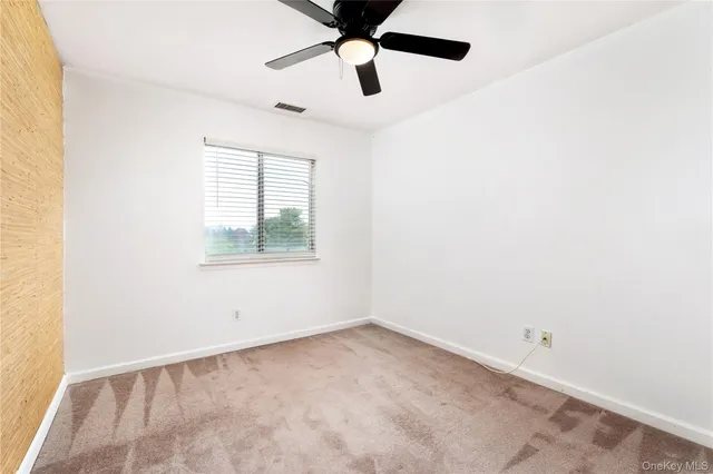 a bathroom with a sink mirror toilet and bathtub