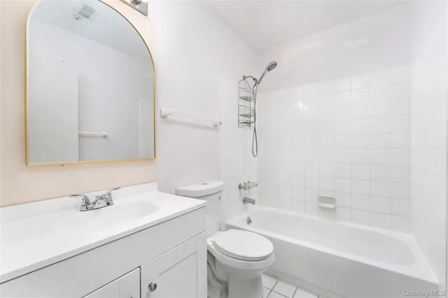 a view of a hallway with washer and dryer