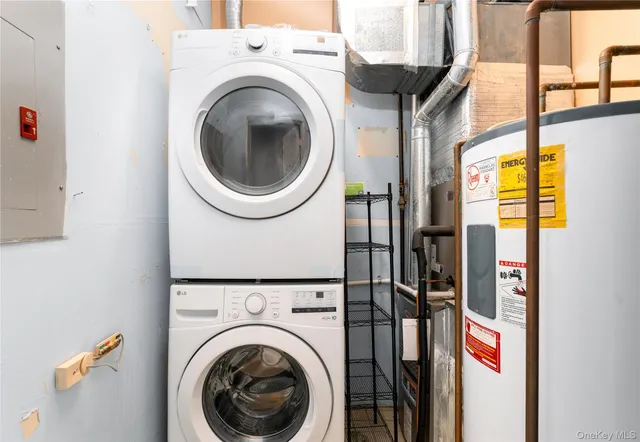 a front view of a house with a garden and yard