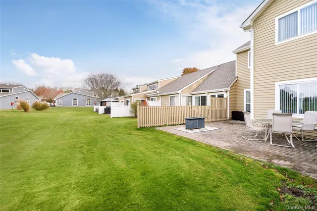 a view of a swimming pool with a dining room
