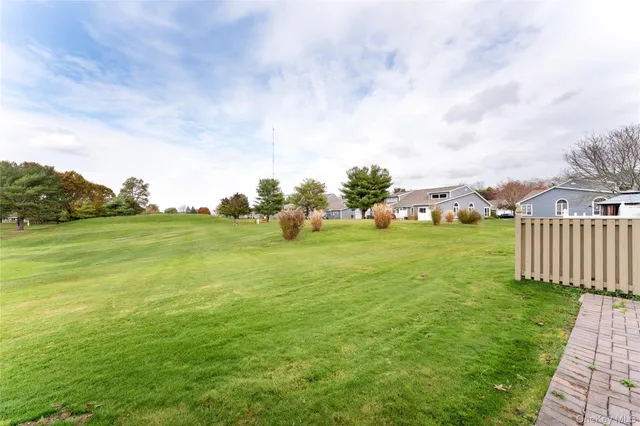 a view of a golf course with a garden