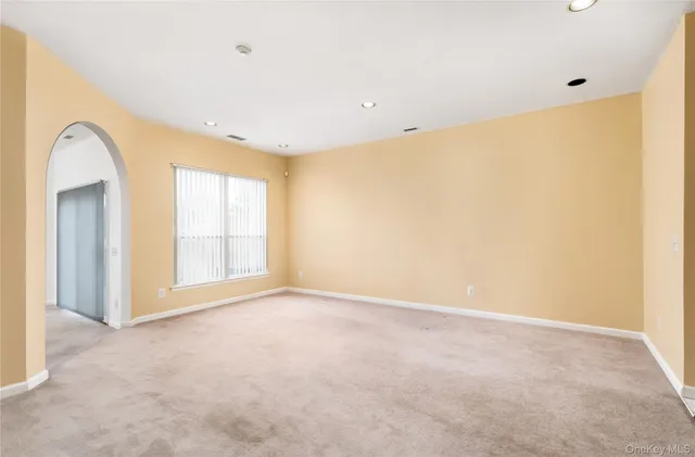 a view of a livingroom with a staircase