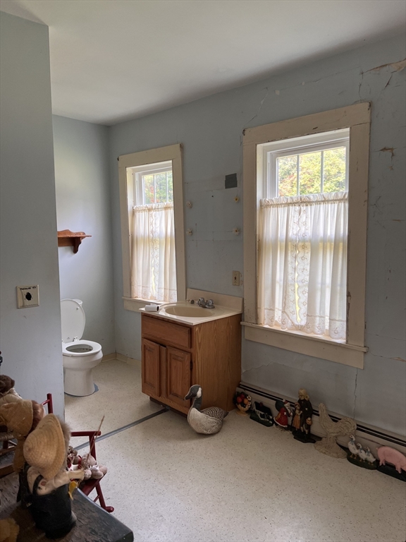 146 Potter Road Rowe, MA 01367 - Photo 15 of 40 a room with furniture and a window