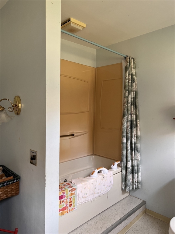 146 Potter Road Rowe, MA 01367 - Photo 16 of 40 a bedroom with a bed and a window