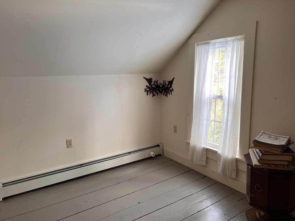 146 Potter Road Rowe, MA 01367 - Photo 18 of 40 an empty room with windows