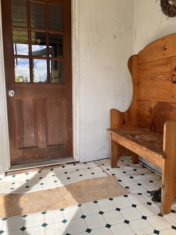 146 Potter Road Rowe, MA 01367 - Photo 25 of 40 a wooden bench sitting in front of a window