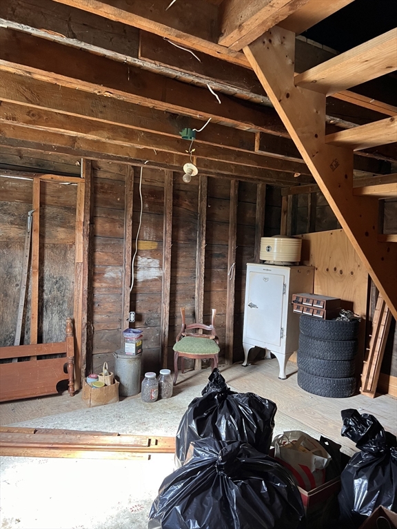 146 Potter Road Rowe, MA 01367 - Photo 26 of 40 a bedroom with furniture and a window