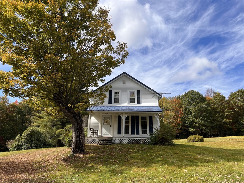 146 Potter Road Rowe, MA 01367 - Photo 39 of 40 a house that has tree in front of it