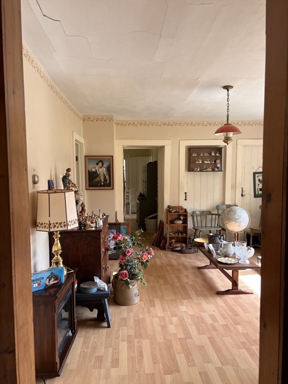 146 Potter Road Rowe, MA 01367 - Photo 8 of 40 a living room with furniture window and a flat screen tv