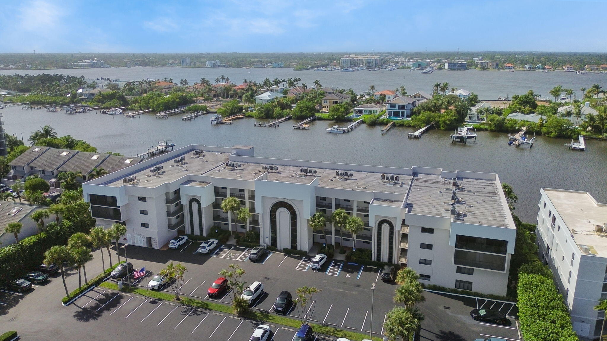 3525 South Ocean Boulevard, Unit 107 South Palm Beach, FL 33480 - Photo 1 of 21 an aerial view of a house with a lake view