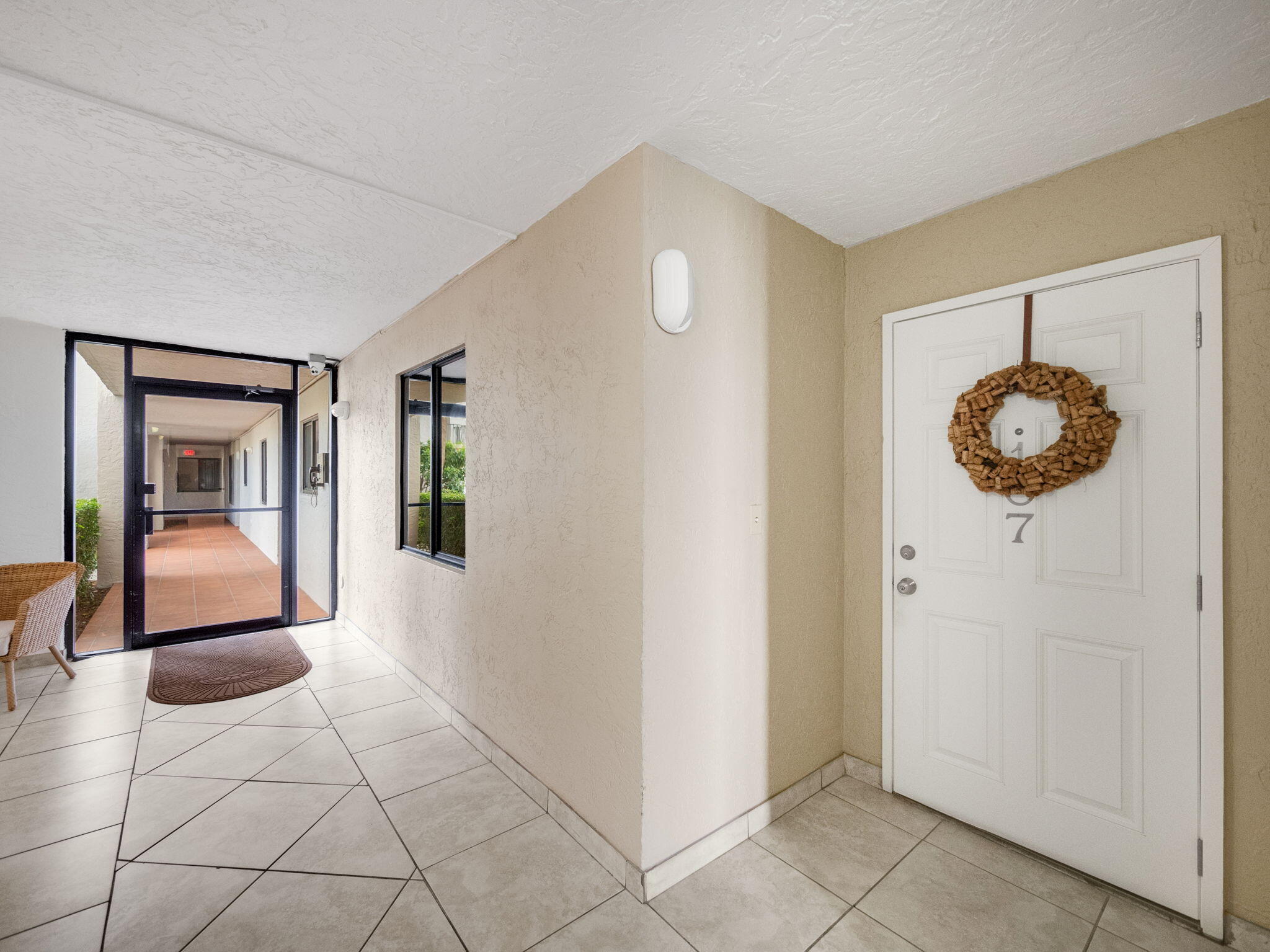 3525 South Ocean Boulevard, Unit 107 South Palm Beach, FL 33480 - Photo 5 of 21 a view of an entryway