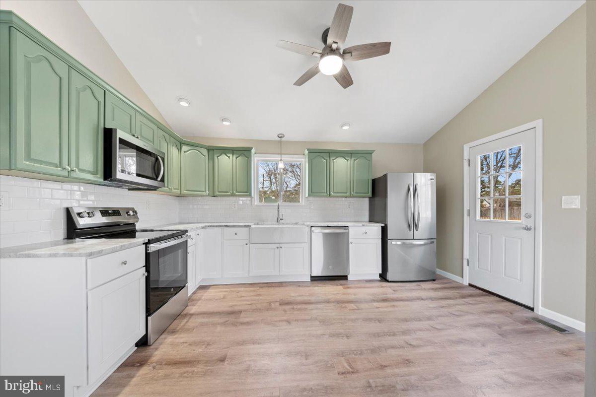 308 Apache Trail Browns Mills, NJ 08015 - Photo 15 of 34 a kitchen with a refrigerator sink and microwave