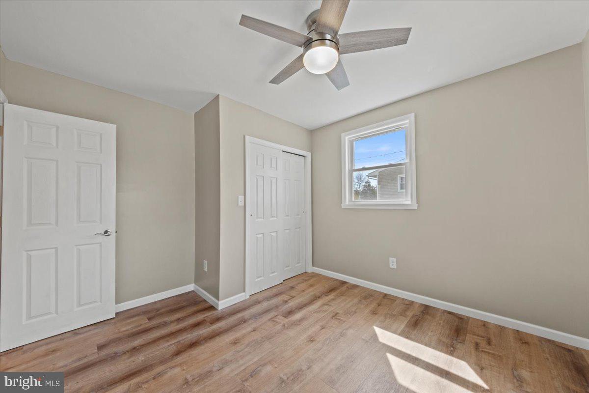 308 Apache Trail Browns Mills, NJ 08015 - Photo 21 of 34 a view of empty room with wooden floor