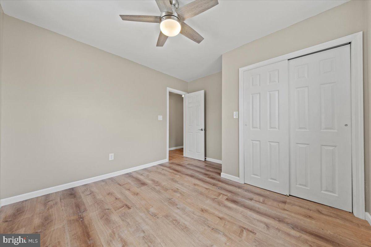 308 Apache Trail Browns Mills, NJ 08015 - Photo 22 of 34 a view of an empty room with wooden floor