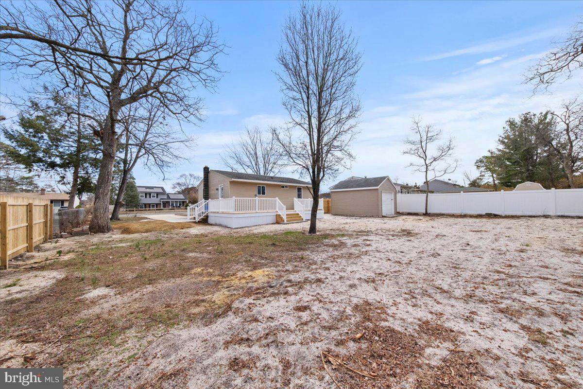 308 Apache Trail Browns Mills, NJ 08015 - Photo 32 of 34 a fire hydrant in the middle of a field