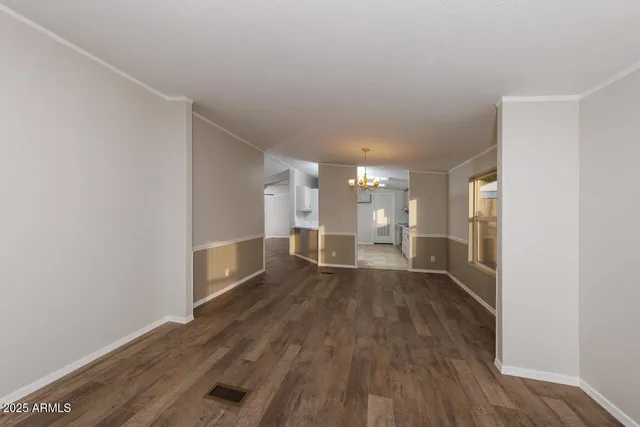 a kitchen with granite countertop a sink and a stove top oven