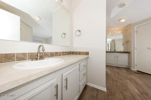 a white bath tub sitting next to a window