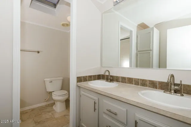 a bedroom with a bed and closet