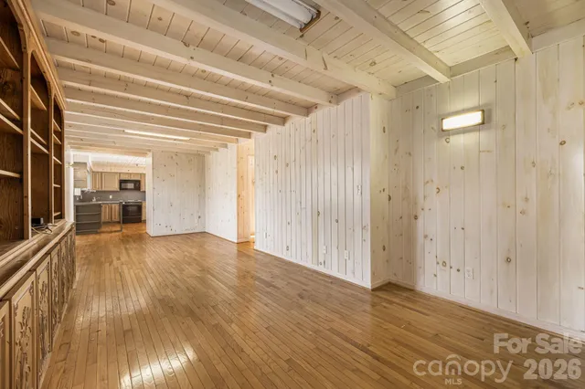 a view of a livingroom with wooden floor