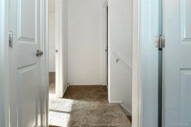 a bathroom with a sink a toilet and a shower