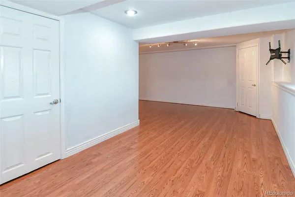 a view of storage and utility room with washer and dryer