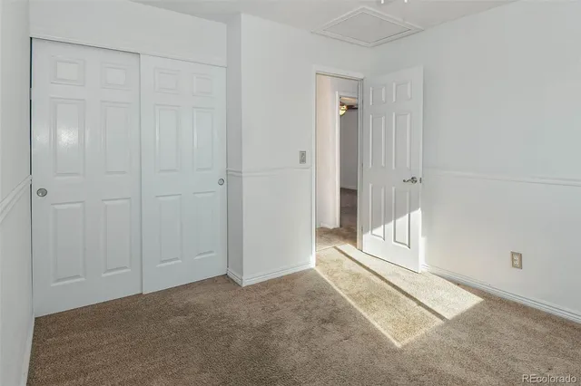 an empty room with window