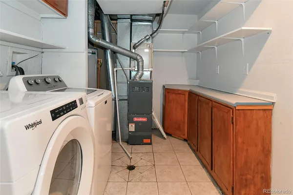 a view of balcony with wooden floor and fence