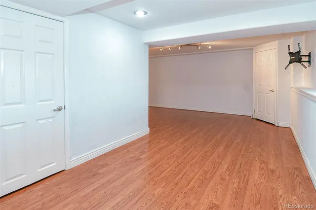 a view of storage and utility room with washer and dryer