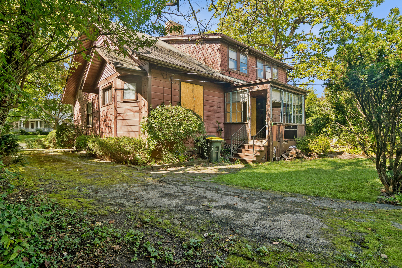 785 Locust Street Winnetka, IL 60093 - Photo 3 of 19 a view of a house with a yard and plants